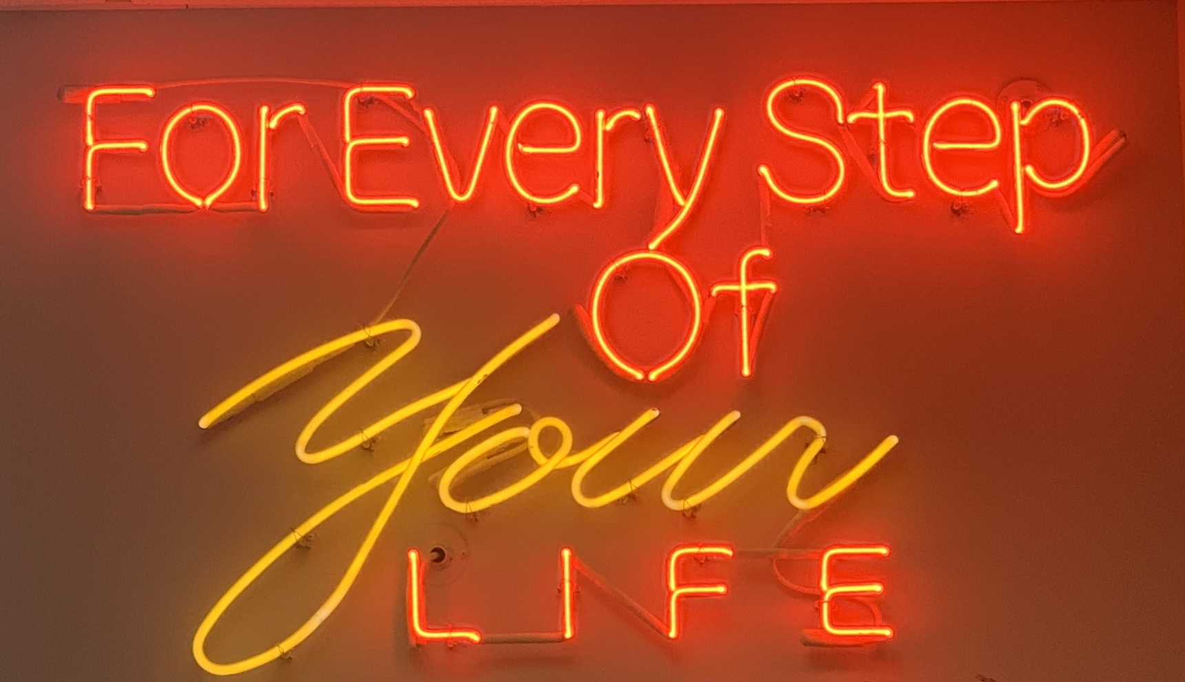neon sign that reads for every step of your life